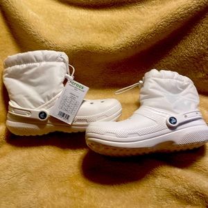 Brand new Crocs that have lined neo puff boot like features